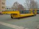 3 Axle Low Bed Semi Trailer Red Color With Self Steering Axles And Hydraulic Ramps